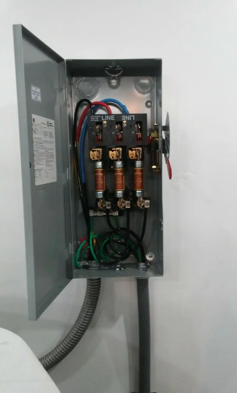 Three-phase disconnect switch installed for Smoke Detector Installation in South Kensington